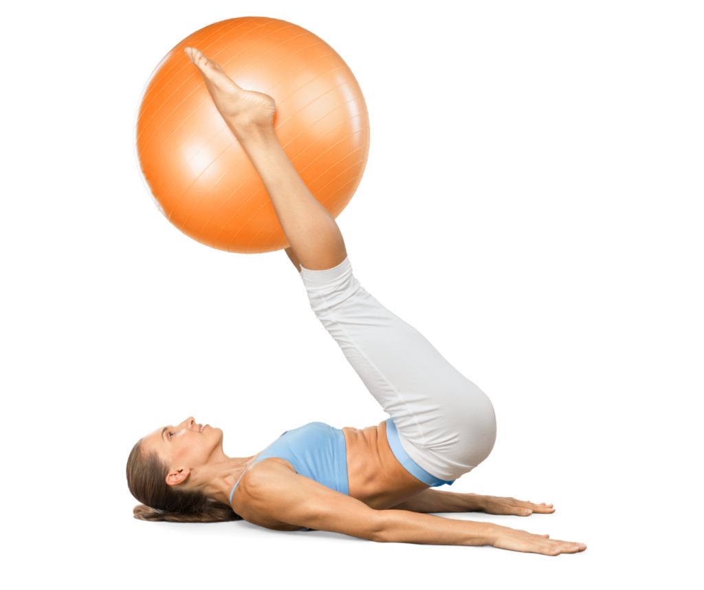 woman holding a fitness ball between her legs at a home workout
